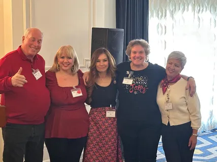 Melina Sardar with fellow volunteers at a community event
