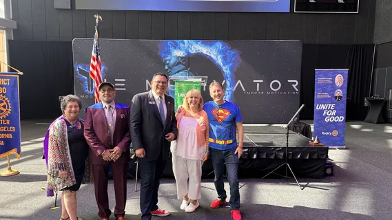 Melina Sardar with speakers at a community event