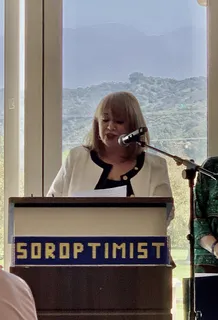 Melina Sardar speaking at a Soroptimist event